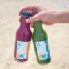 Hand Holding 2 Organic Krush cold-press juices