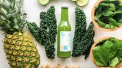 Organic Krush Juice bottle - Rex Appeal - surrounded by fresh ingredients